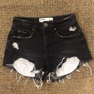 Distressed black shorts